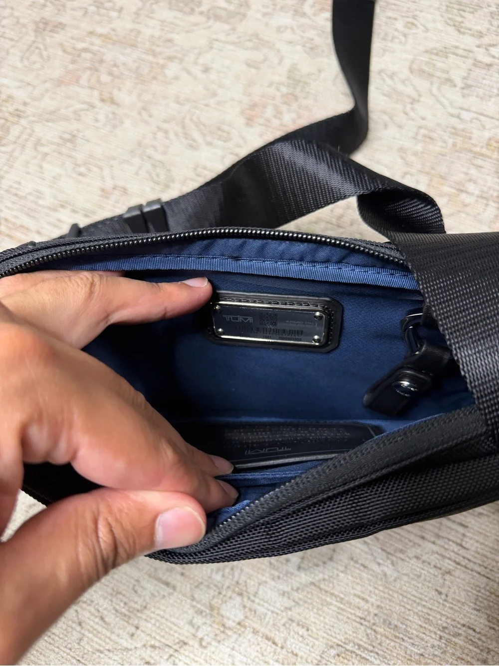 Tumi Black Men's Sling Belt Bag with Silver Accents